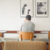 people sitting at table in cafe