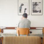 people sitting at table in cafe