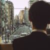 businessman overlooking tokyo cityscape