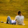 relaxing on a hill in golden afternoon light